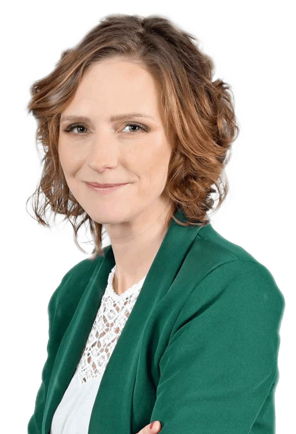 Uśmiechnięta właścicielka marki Słowa Klucze w zielonej marynarce i białej ażurowej bluzce.