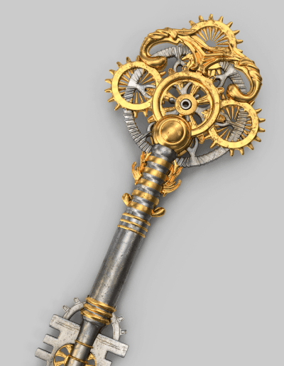 Fantazyjny złoto-srebrny klucz, który symbolizuje markę Słowa Klucze.